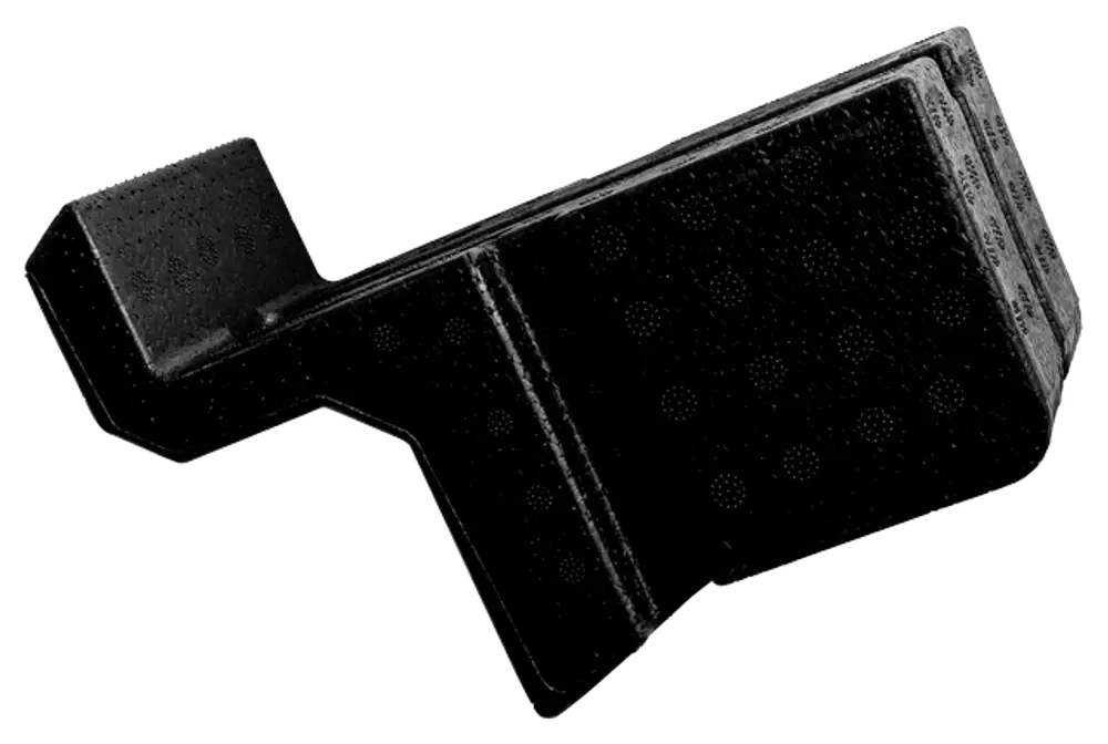 Schwarzes Füllstück aus EPP, mit konturiertem Design, möglicherweise für die Verwendung in einem Wolf-Produkt, erkennbar an der strukturierten Oberfläche.